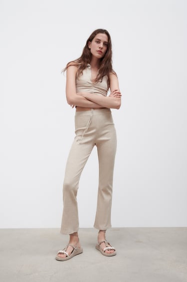 FLARE RIBBED TROUSERS