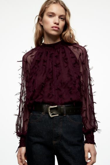 BLOUSE WITH TRIMS