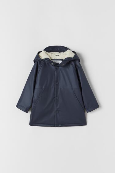 RUBBERISED WATER-REPELLENT RAINCOAT WITH FAUX SHEARLING