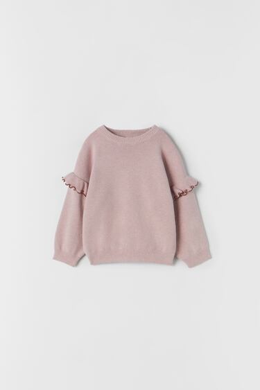 KNIT SWEATER WITH OVERLOCKING