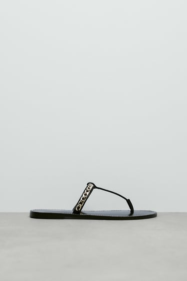 FLAT LEATHER SANDALS WITH CHAIN