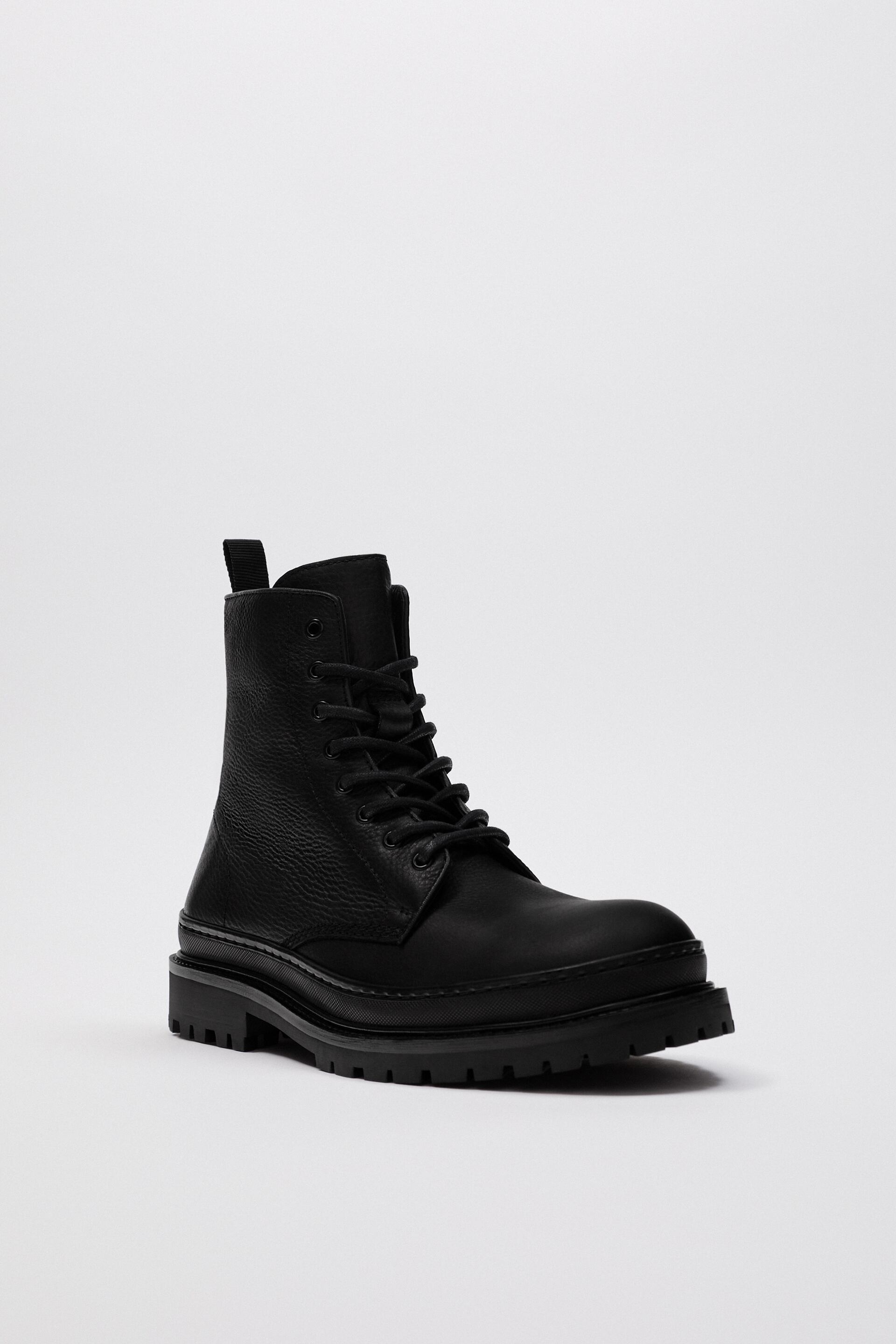 THICK SOLED LACED LEATHER BOOTS