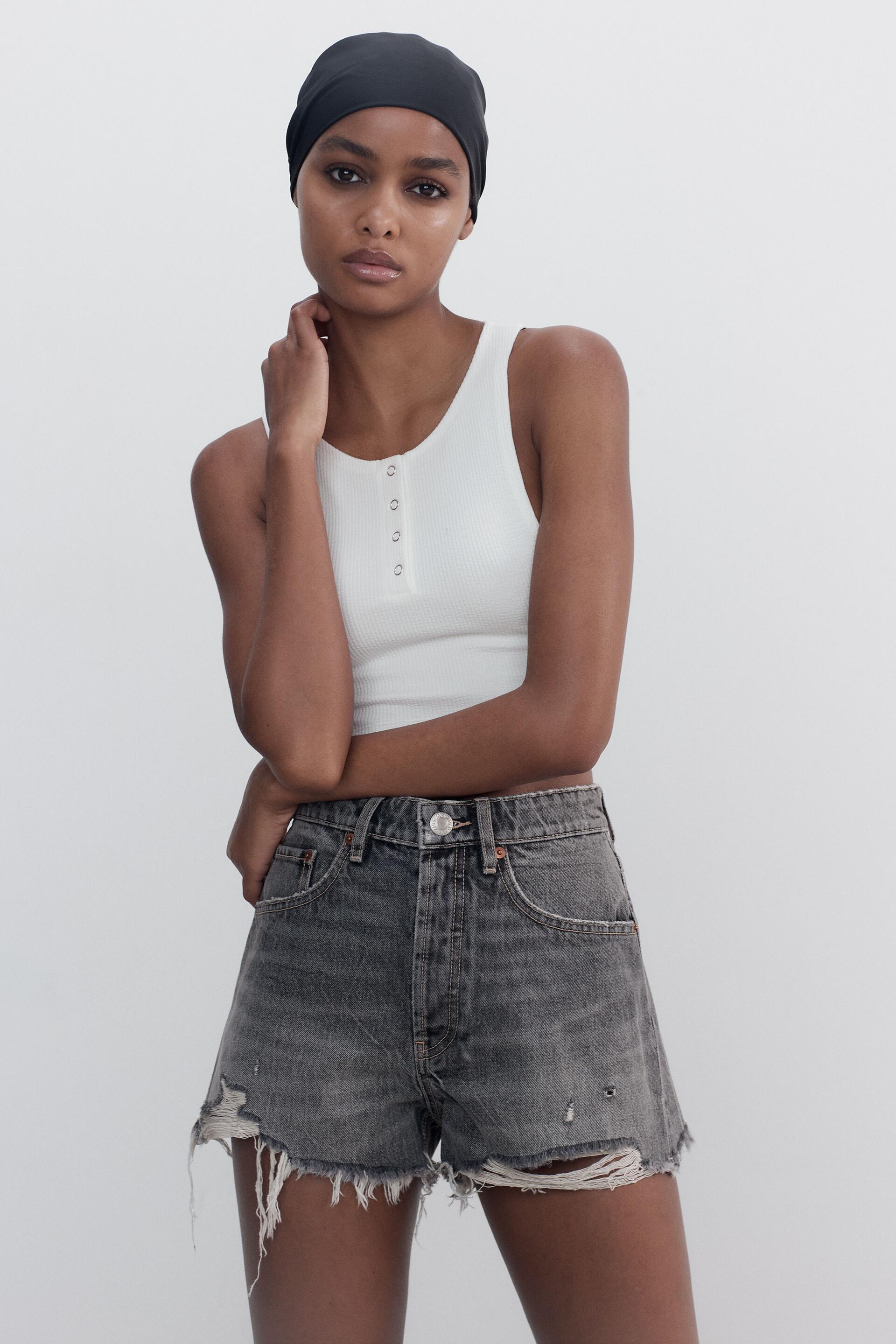 HIGH-RISE FRAYED DENIM SHORTS 
