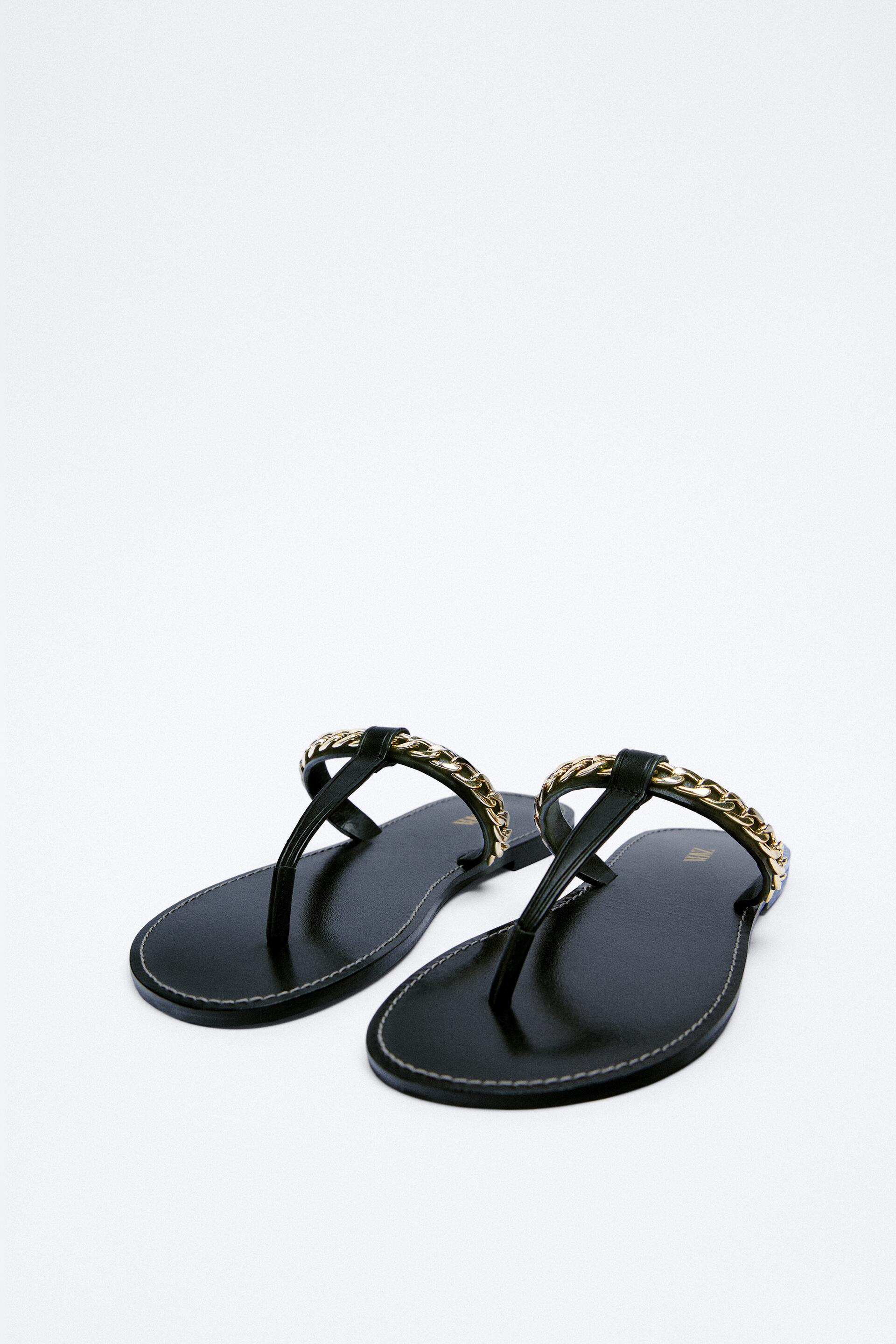 silver and black flat sandals