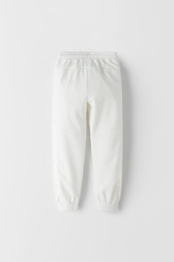 Pantalón brillo Zara - ZARA