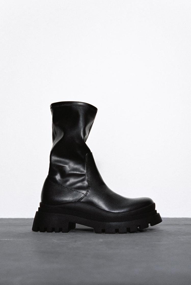 Botin negro suela track clearance