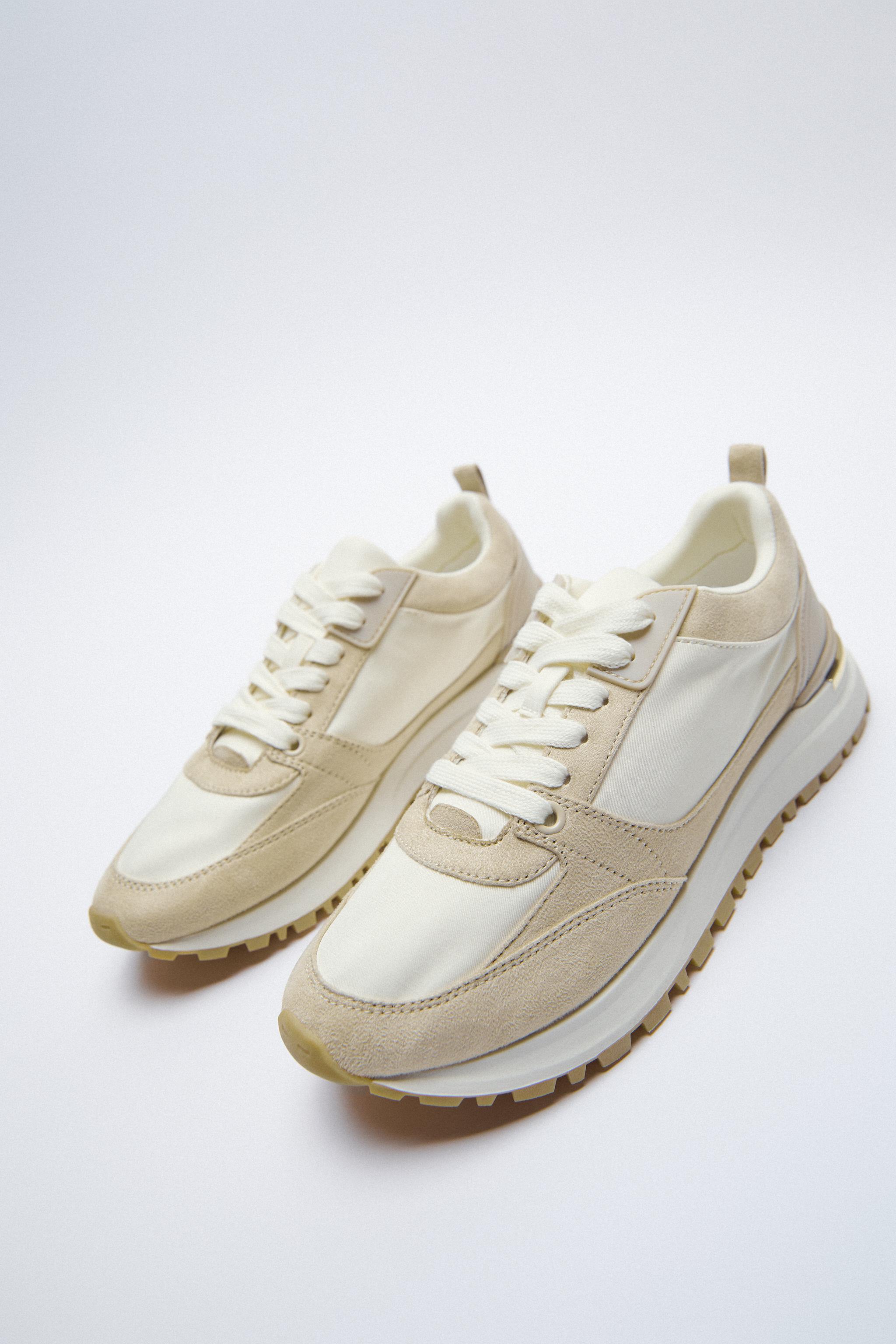 TRAINERS WITH CONTRAST METALLIC PIECE