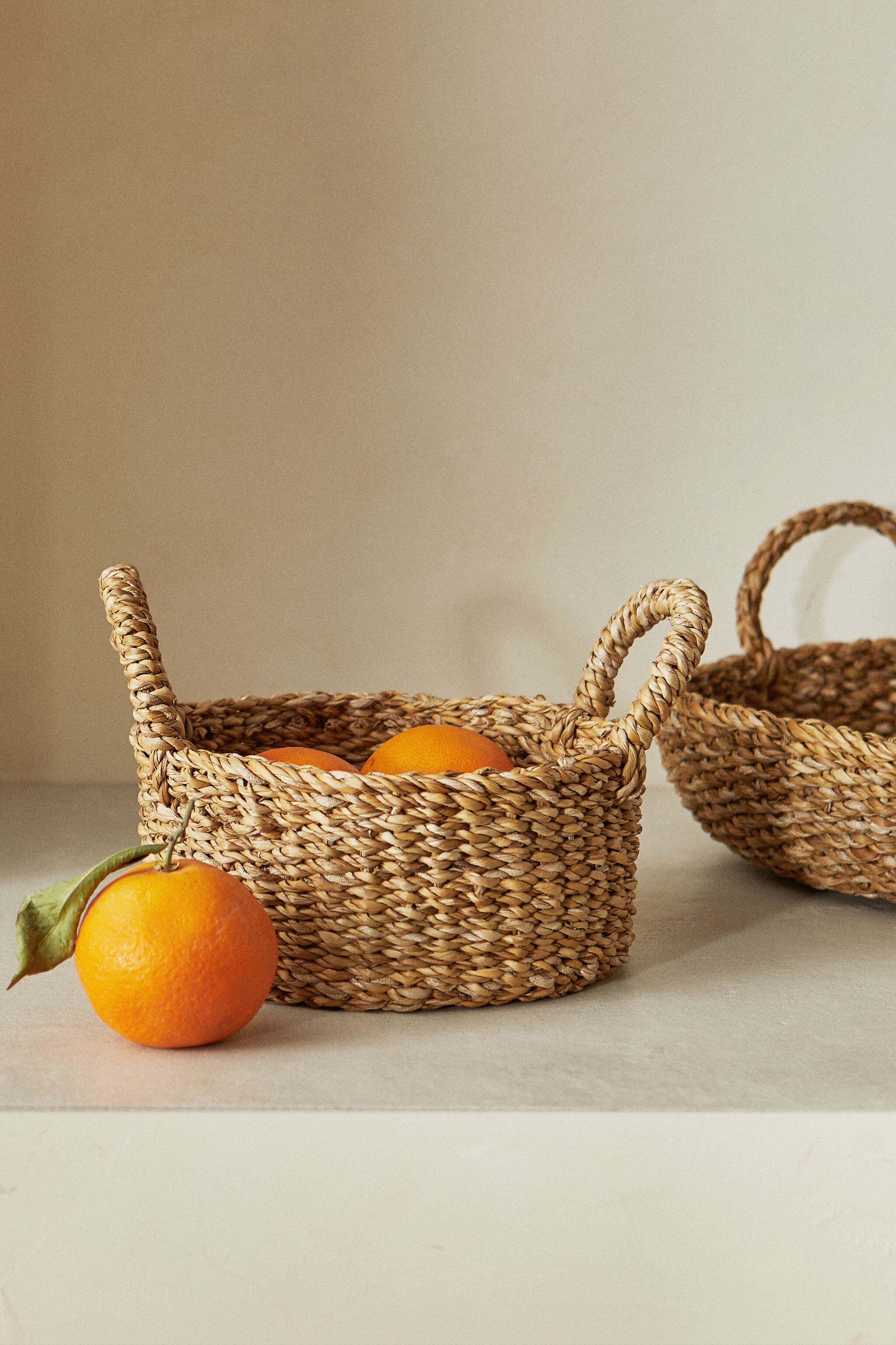 WOVEN BASKET WITH HANDLES