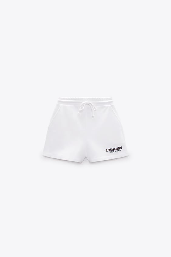 zara.com | Shorts with embroidered slogan