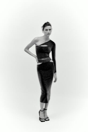 Image 0 of CUT OUT SKIRT WITH METALLIC THREAD from Zara