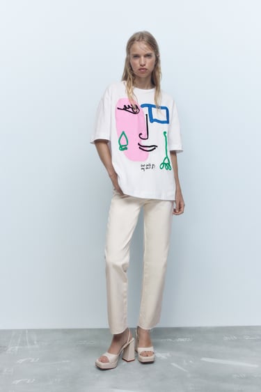 Image 0 of EMBROIDERED DRAWSTRING T-SHIRT WITH FACE PRINT from Zara