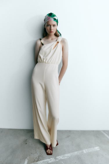 Image 0 of ASYMMETRIC JUMPSUIT WITH STONE STRAP from Zara