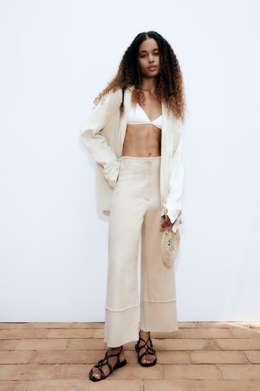 Image 0 of FRAYED RUSTIC TROUSERS from Zara