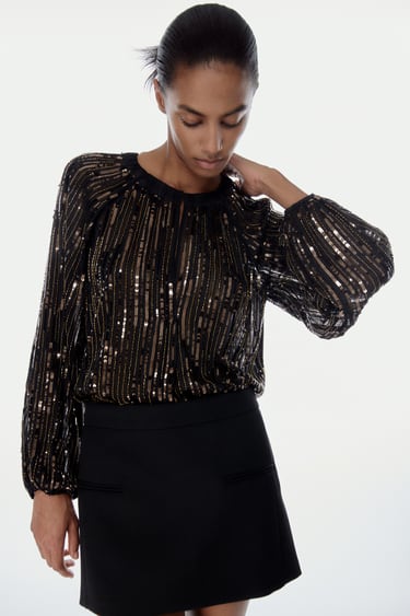 Image 0 of VOLUMINOUS BLOUSE WITH SEQUINS from Zara