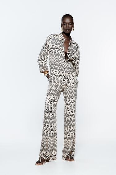 Image 0 of PRINTED FLOWING TROUSERS from Zara