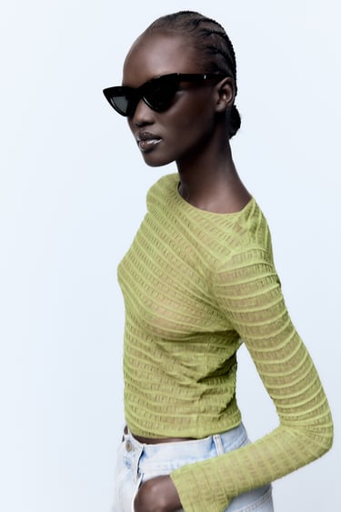 Image 0 of SEMI-SHEER TEXTURED KNIT SWEATER from Zara