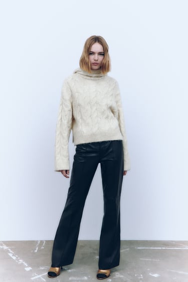 Image 0 of HOODED CABLE-KNIT SWEATER from Zara