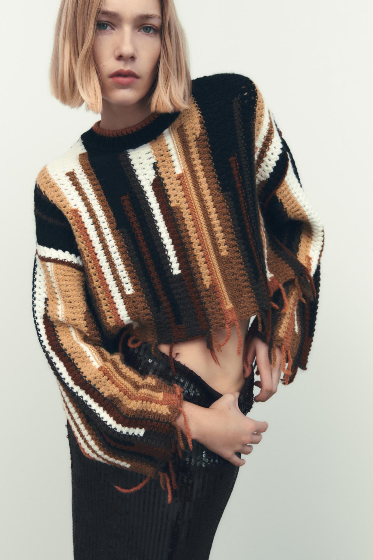 FRINGED KNIT SWEATER