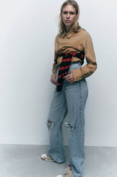 Image 0 of RIPPED WIDE LEG JEANS from Zara
