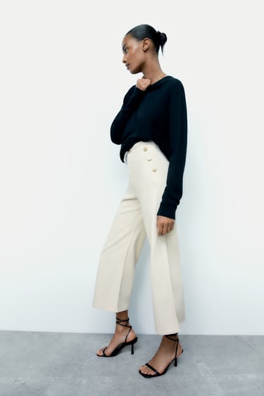 Image 0 of Z1975 CROPPED WIDE-LEG JEANS WITH GOLDEN BUTTONS from Zara