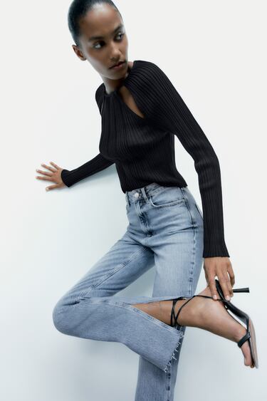 Image 0 of Z1975 HIGH RISE SLIM FLARED JEANS WITH RIPPED DETAILS from Zara