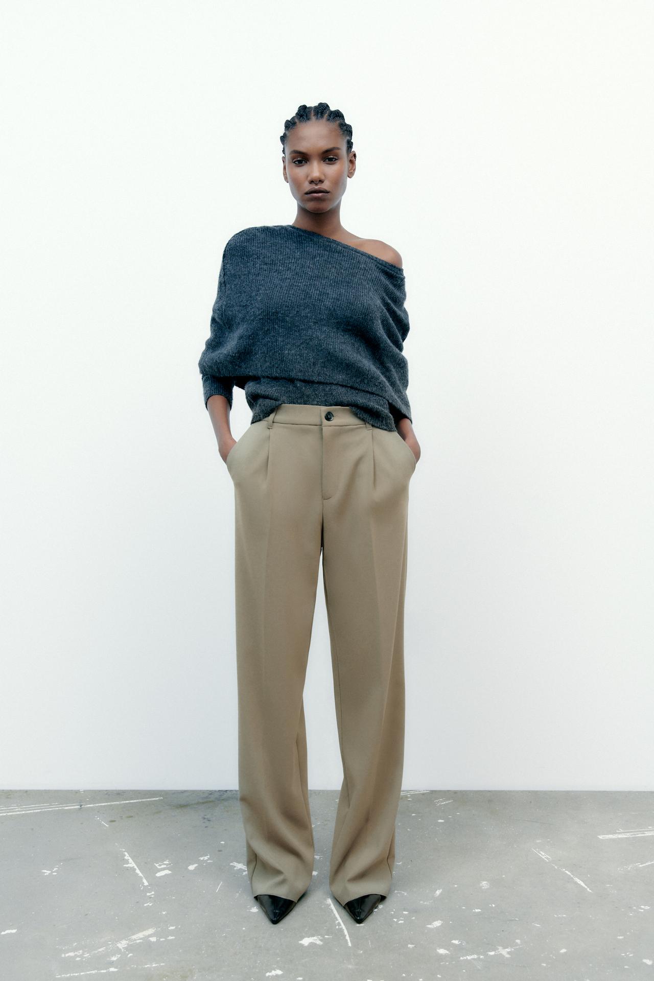 Zara staple High-waist trousers with side pockets, false welt back pockets, front visible dart detailing, a zip fly and a top button fastening. Thye come in this featured khaki pair, black and grey pinstripe.