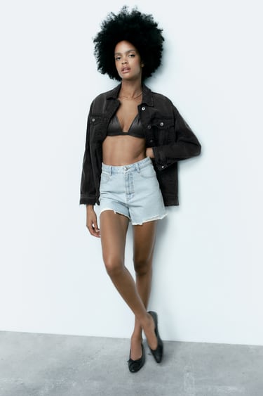 Image 0 of HIGH-RISE DENIM SHORTS WITH RIPPED HEMS from Zara