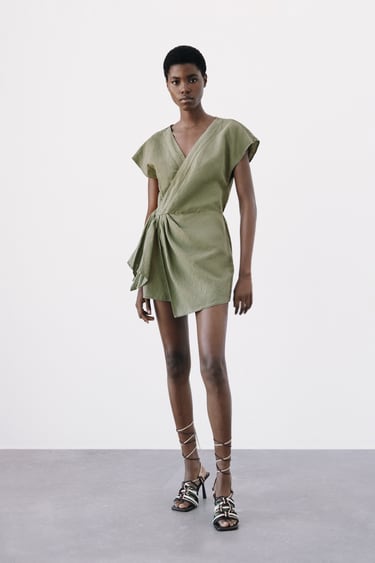 Image 0 of LINEN-BLEND PLAYSUIT WITH KNOT DETAIL from Zara