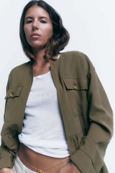 Image 0 of OPEN JACKET WITH RUFFLE TRIM from Zara