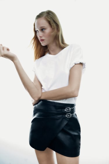 Image 0 of FAUX LEATHER SKIRT WITH BUCKLES from Zara