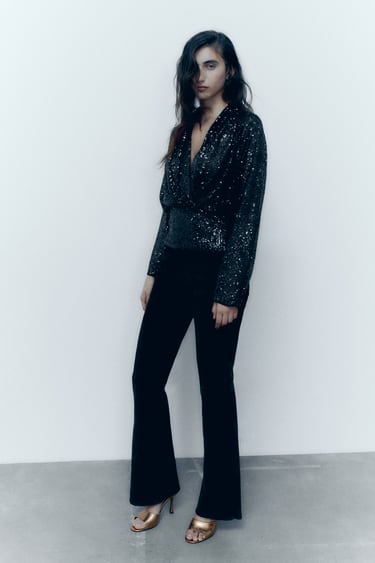 Image 0 of DRAPED SEQUIN BLOUSE from Zara
