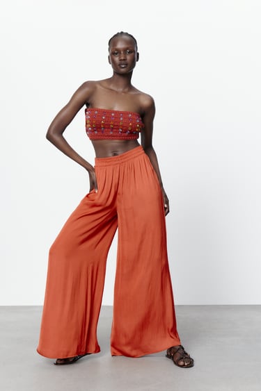Image 0 of WIDE-LEG FLOWING TROUSERS from Zara