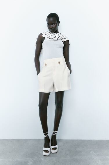 Image 0 of FLOWING BERMUDA SHORTS WITH GOLDEN BUTTONS from Zara
