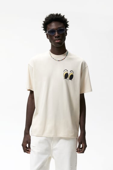 Image 0 of T-SHIRT WITH PRINTED GRAPHICS from Zara