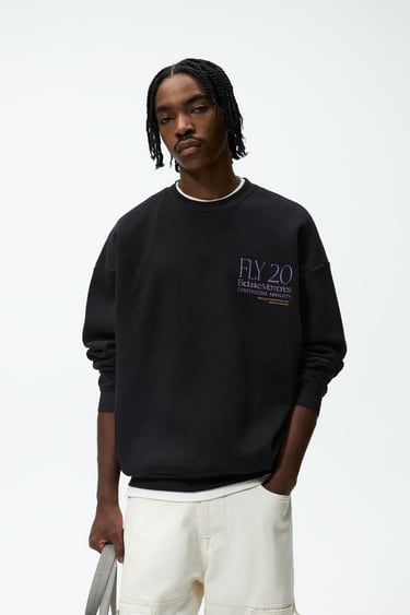 Image 0 of HOODIE WITH CONTRAST PATCHES from Zara