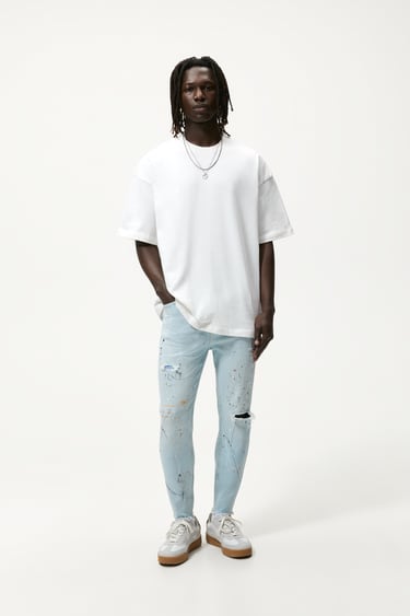 Image 0 of RIPPED SLIM-FIT JEANS from Zara