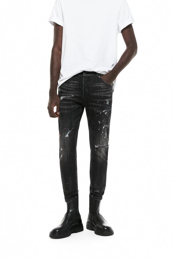 TAPERED FIT PAINT SPLATTER JEANS