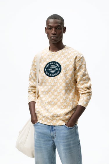 Image 0 of PRINTED SWEATSHIRT WITH PATCH from Zara