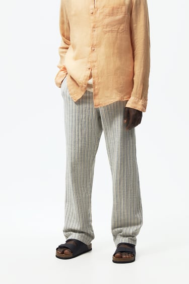 Image 0 of STRIPED STRAIGHT FIT TROUSERS from Zara