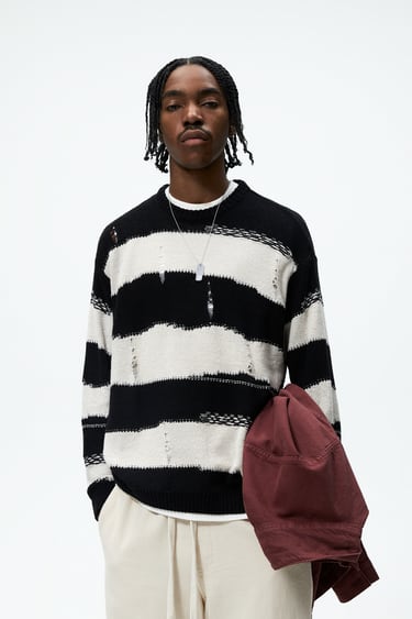 Image 0 of RIPPED STRIPED SWEATER from Zara