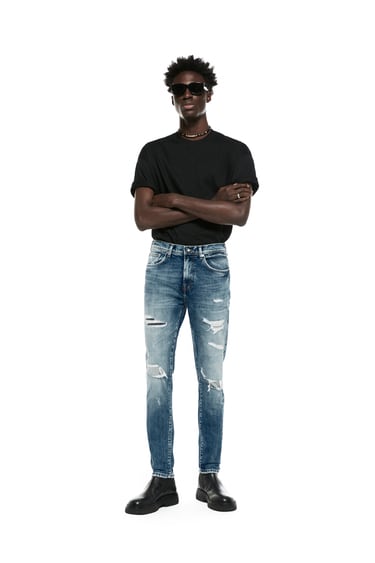 Image 0 of RIPPED JEANS WITH TOPSTITCHING from Zara