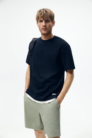 Image 0 of T-SHIRT WITH DOUBLE FINISH from Zara