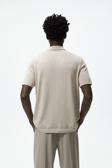Image 0 of KNIT POLO SHIRT WITH ZIP from Zara