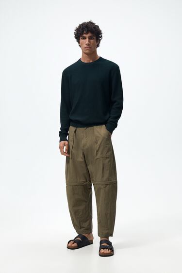 Image 0 of DETACHABLE LEG TROUSERS from Zara