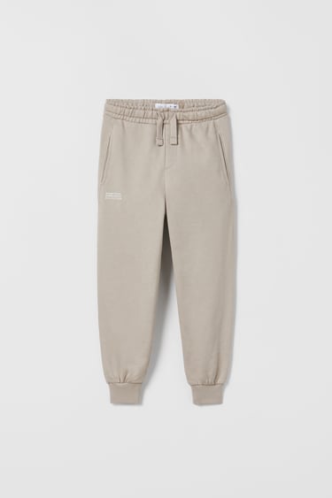 Image 0 of PLUSH TROUSERS WITH LABEL AND SEAM DETAILS from Zara