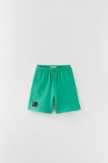 Image 0 of PLUSH BERMUDA SHORTS WITH LABEL DETAIL from Zara