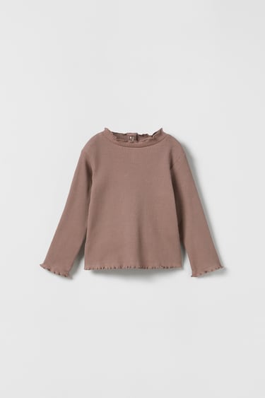 Image 0 of RUFFLY RIBBED TURTLENECK from Zara