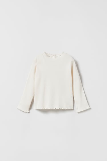 Image 0 of RUFFLY RIBBED TURTLENECK from Zara