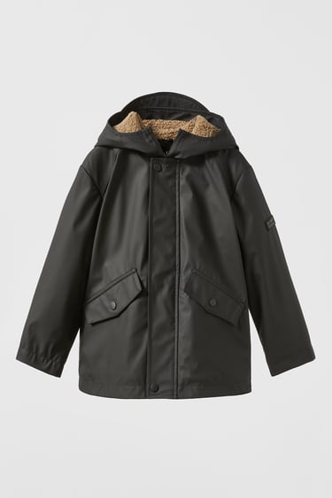 Image 0 of PADDED RUBBERISED PARKA WITH FAUX SHEARLING from Zara