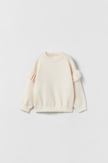 Image 0 of KNIT SWEATER WITH RUFFLE TRIMS from Zara